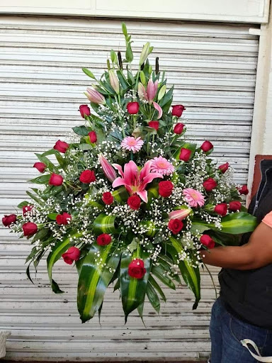 FLORISTERÍA isabella"DICELO CON FLORES "flower shop.